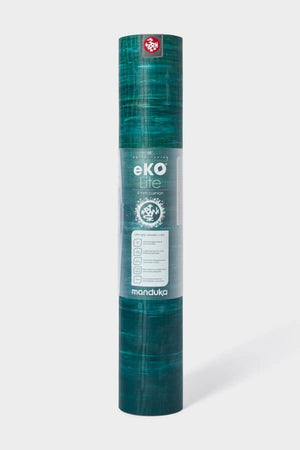 SEA YOGI // Thrive Marbled Ekolite Yoga mat in 4mm by Manduka, standing