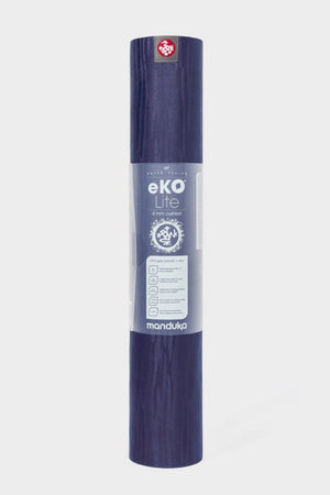 SEA YOGI // New Moon Eko Yoga yoga mat in 5mm by Manduka, standing