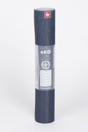 SEA YOGI // eko Lite yoga mat in 4mm and midnight style by Manduka, Online Yoga Shop, standing