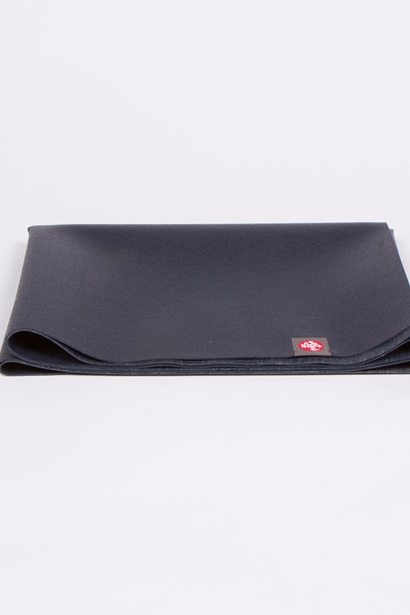 SEA YOGI // eKO Superlite yoga mat in Midnight style, only 1kg in weight by Manduka, folded image