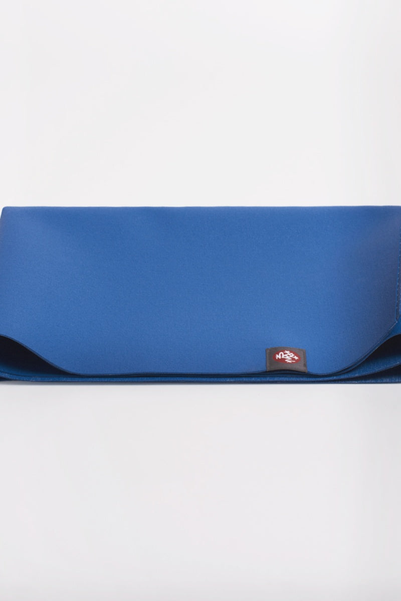 SEA YOGI // eKO SuperLite Yoga mat, only 1kg in Truth Blue style by Manduka, folded image