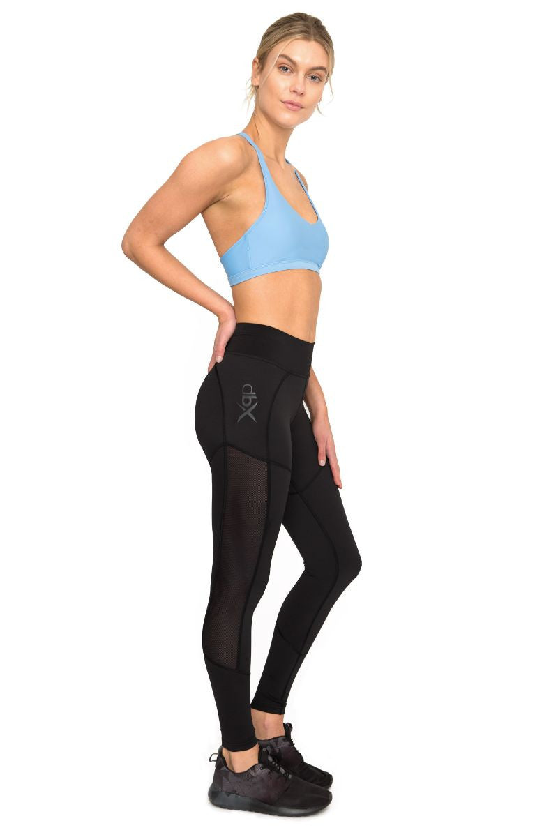 DHARMA BUMS DBX PERFORMANCE COMPRESSION LEGGING IN BLACK AND SIDE IMAGE