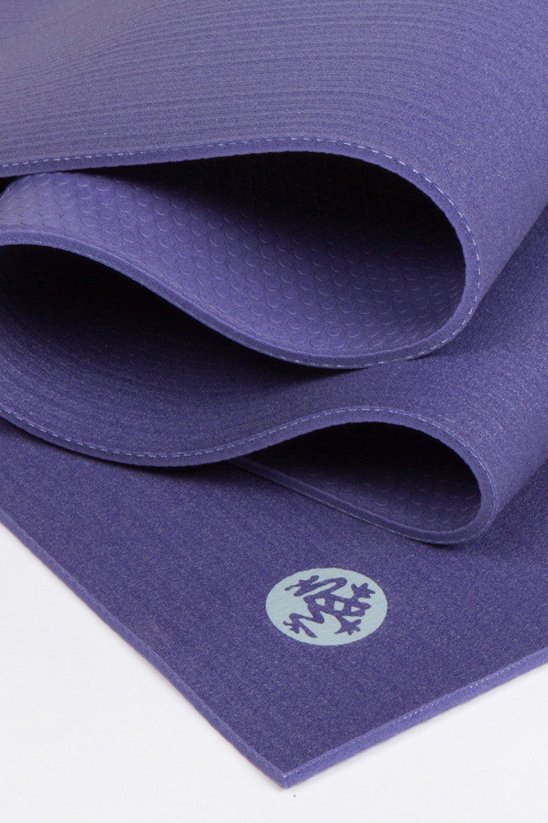 MANDUKA PROLITE YOGA MAT IN PURPLE AND CLOSE UP IMAGE