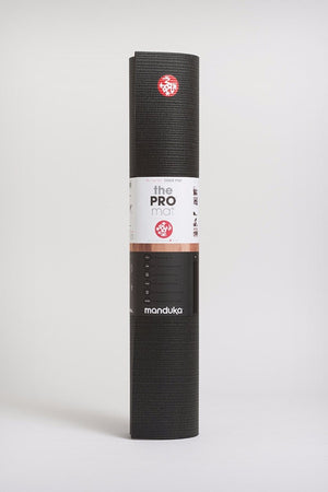 Manduka Pro Mat Black in 5mm and standing image