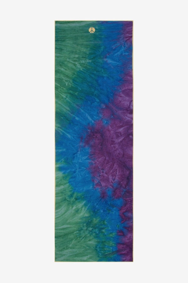 MANDUKA YOGITOES SKIDLESS MAT TOWEL IN PEACOCK STYLE AND SPREAD OUT