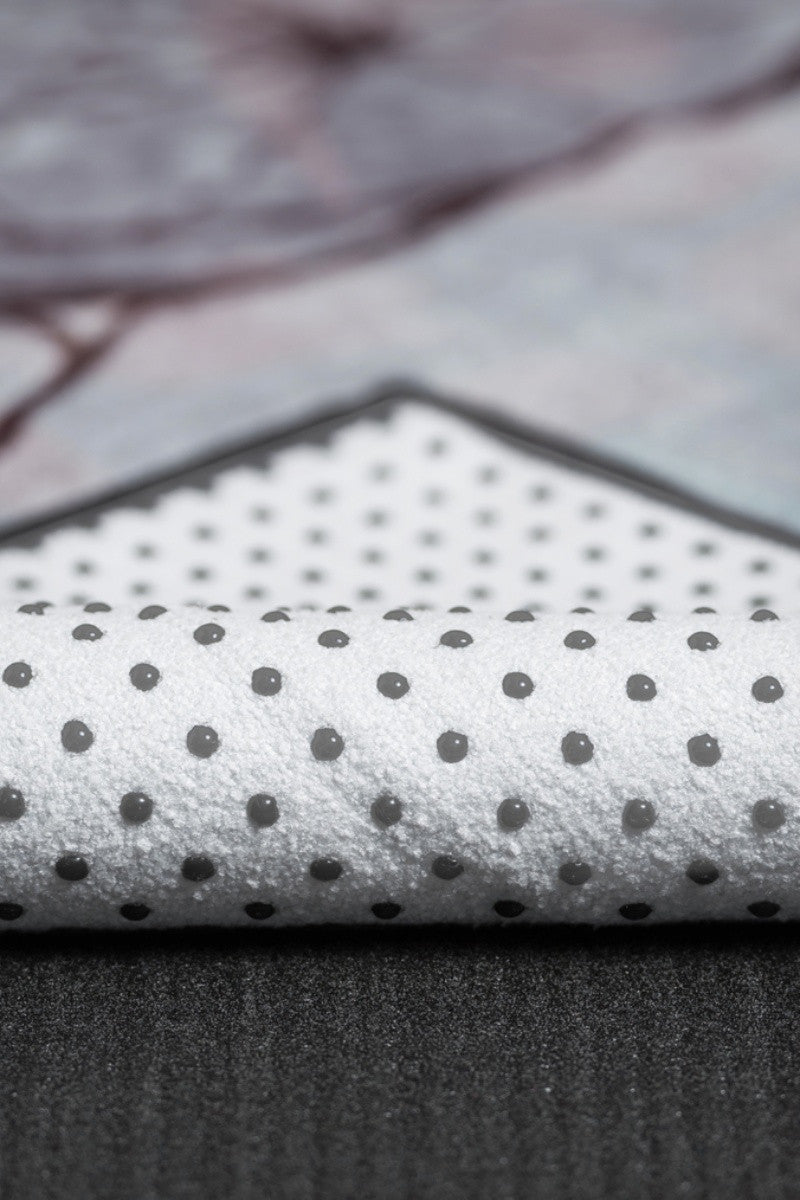 MANDUKA YOGITOES SKIDLESS MAT TOWEL IN STABILITY GANESH STYLE AND CLOSE UP FABRIC IMAGE