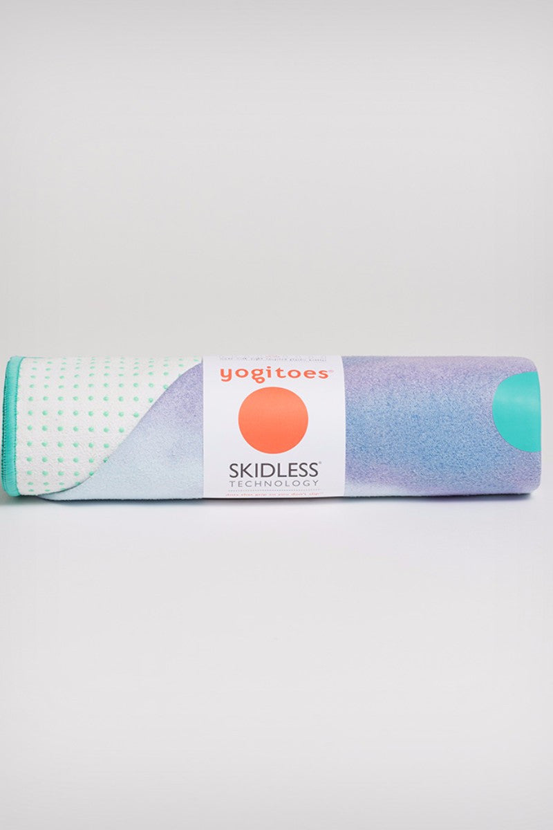 MANDUKA YOGITOES SKIDLESS MAT TOWEL IN VERTEX STYLE AND ROLLED UP IMAGE